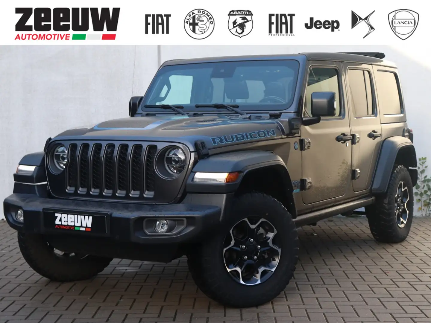 Jeep Wrangler Unlimited 4xe 380 PK Rubicon | Softtop | Leder | C Gris - 1