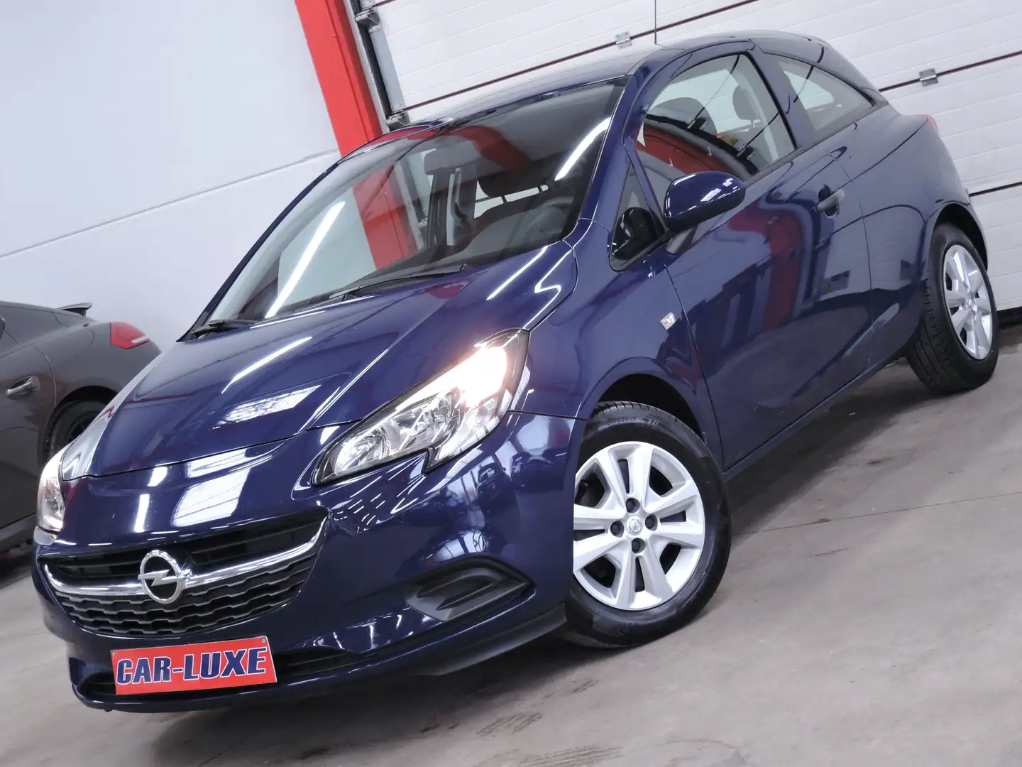 Opel Corsa 1.2i COSMO FAIBLE KM GARANTIE 1 AN Blauw - 1
