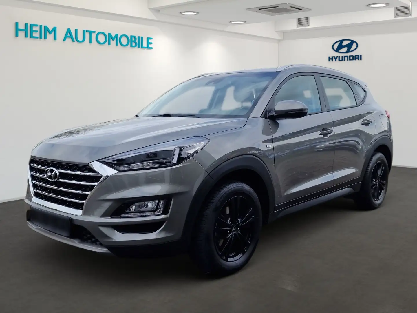 Hyundai TUCSON blue 1.6 CRDi 4WD DCT Trend Grau - 1