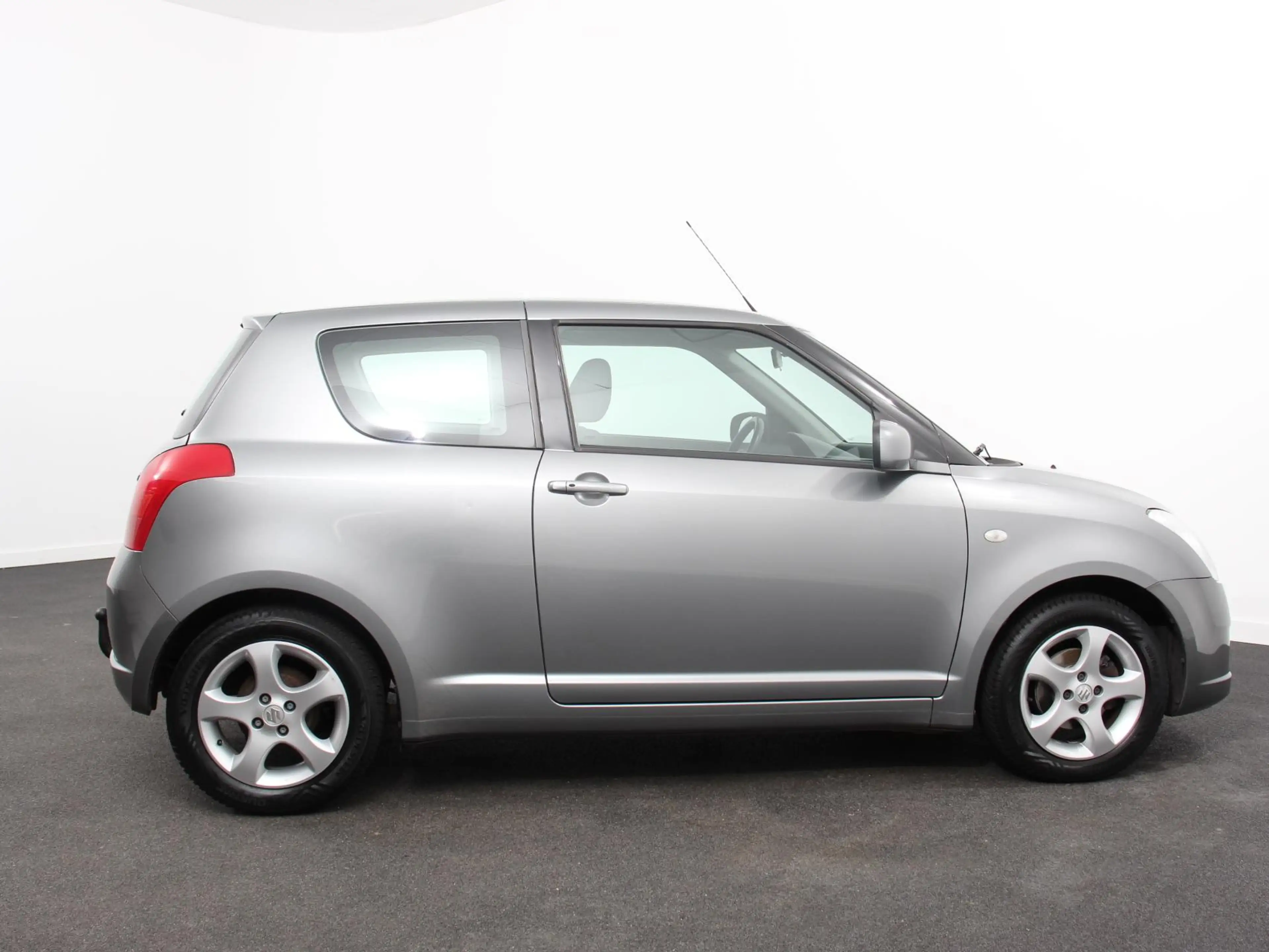Suzuki Swift 1.3 Exclusive Automaat Airco Trekhaak LM velgen EE — photo 8