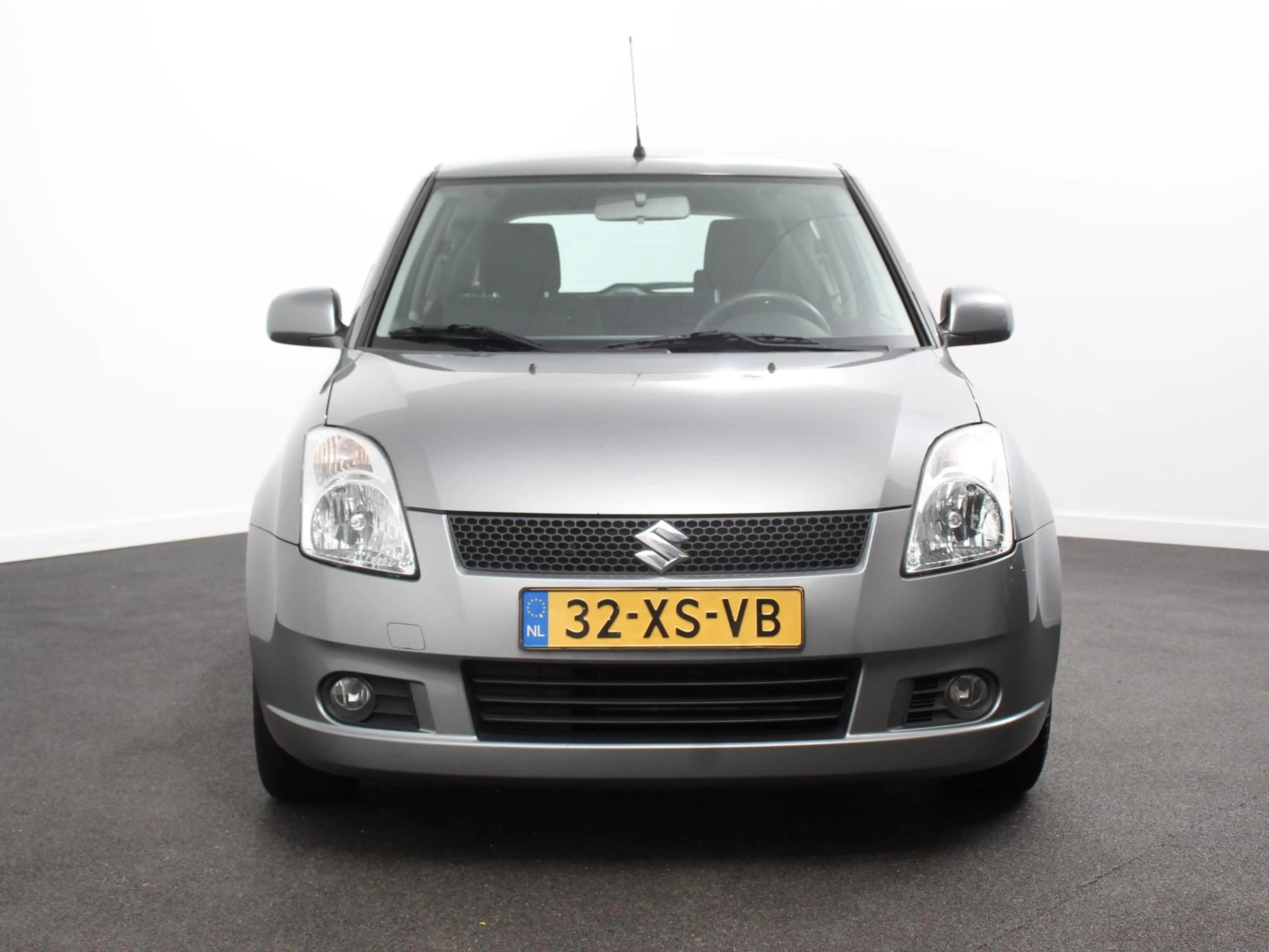 Suzuki Swift 1.3 Exclusive Automaat Airco Trekhaak LM velgen EE — photo 4