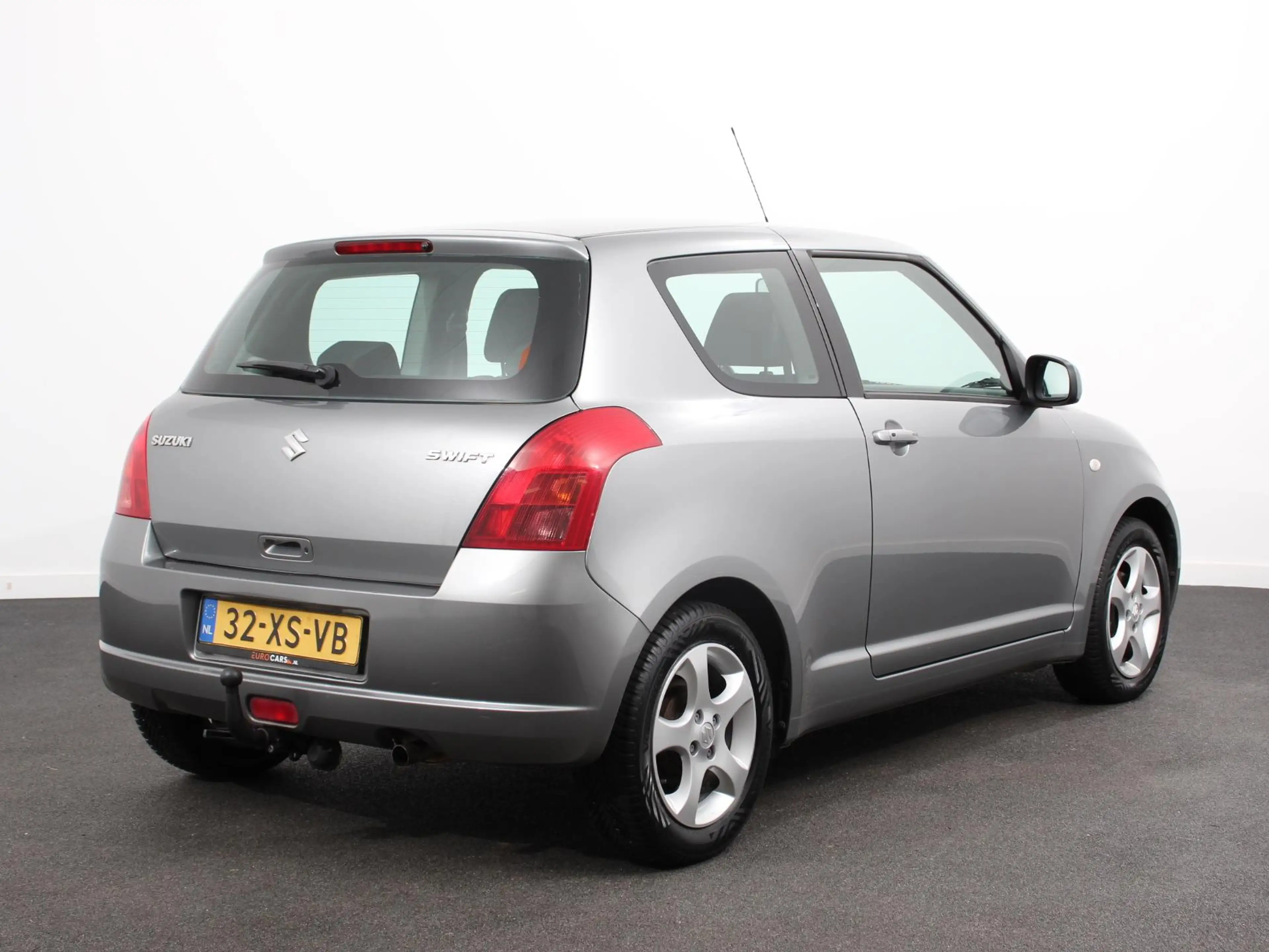 Suzuki Swift 1.3 Exclusive Automaat Airco Trekhaak LM velgen EE — photo 7