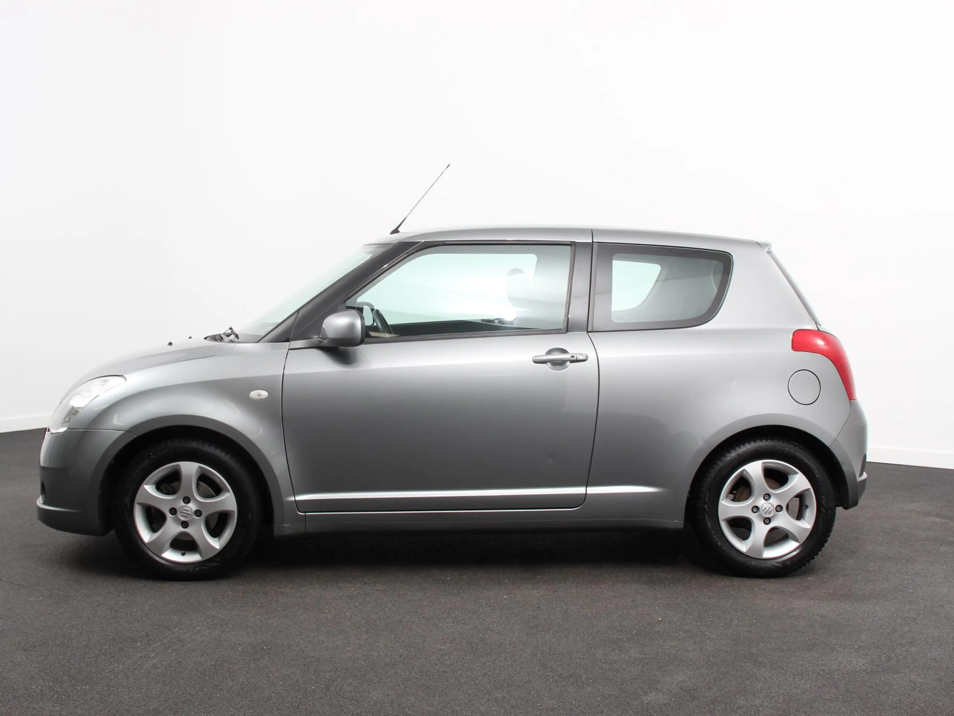 Suzuki Swift 1.3 Exclusive Automaat Airco Trekhaak LM velgen EE — photo 5