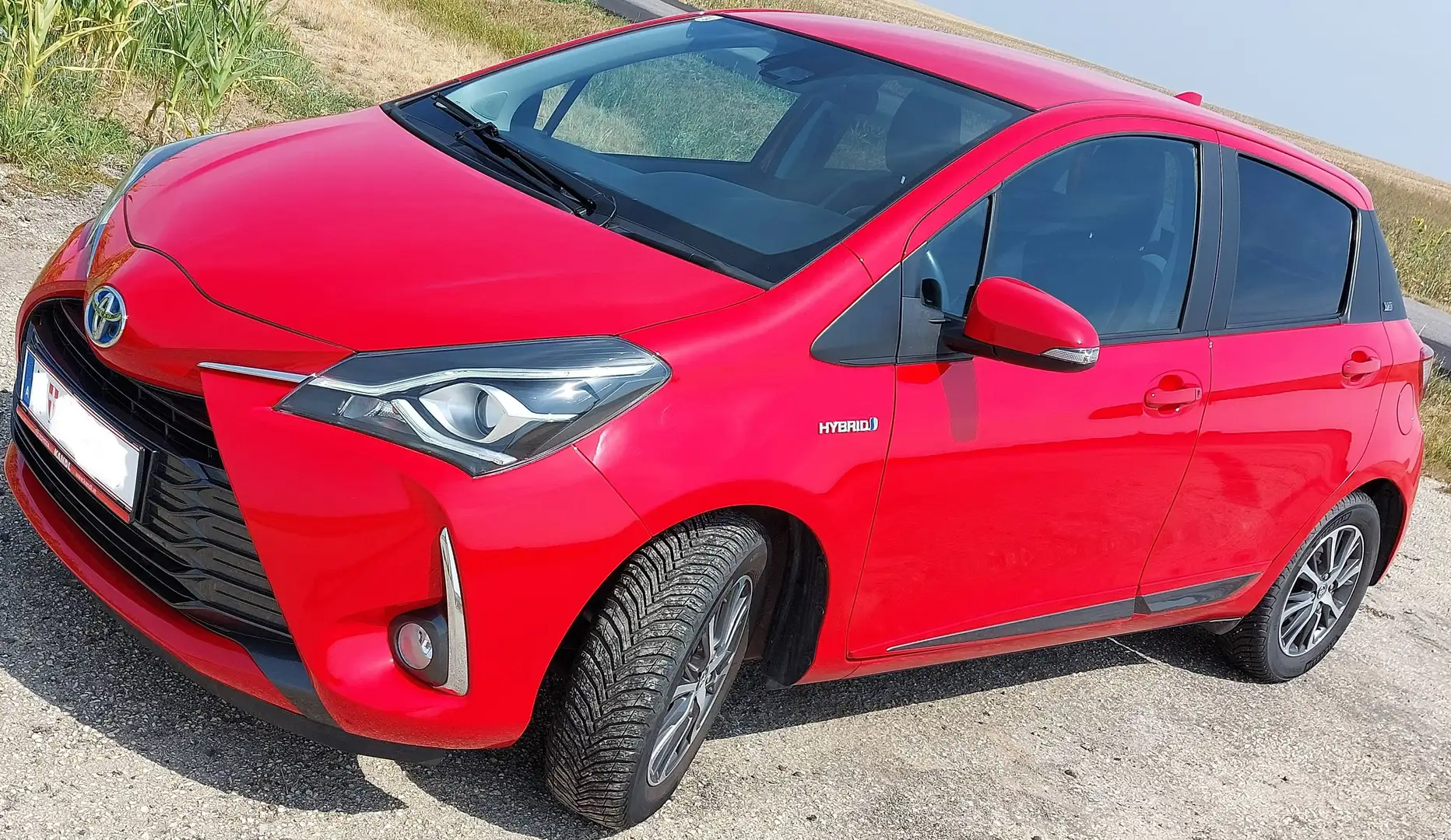Toyota Yaris 1.5 HSD Hybrid 101PS Automatik Top Zustand Jubiläumsedition Y20 Rot - 1