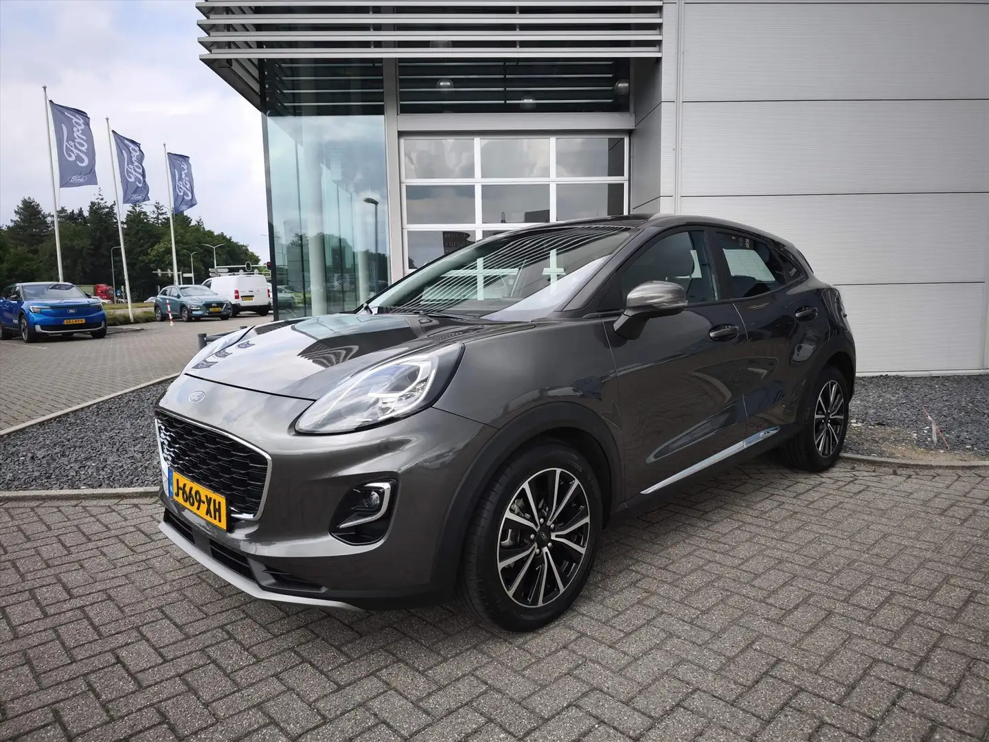 Ford Puma Hybrid 125pk Titanium | Navigatie | Stoelverwarmin Grijs - 1