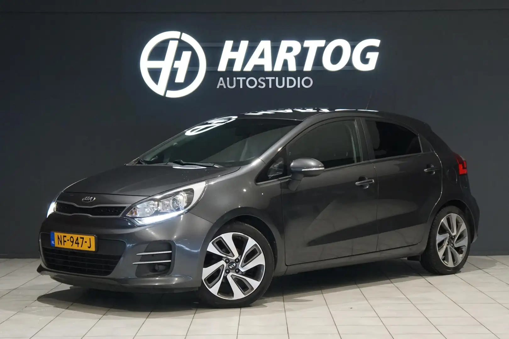 Kia Rio 1.2 CVVT ExecutiveLine + CAMERA / NAVIGATIE / STOE Gris - 1