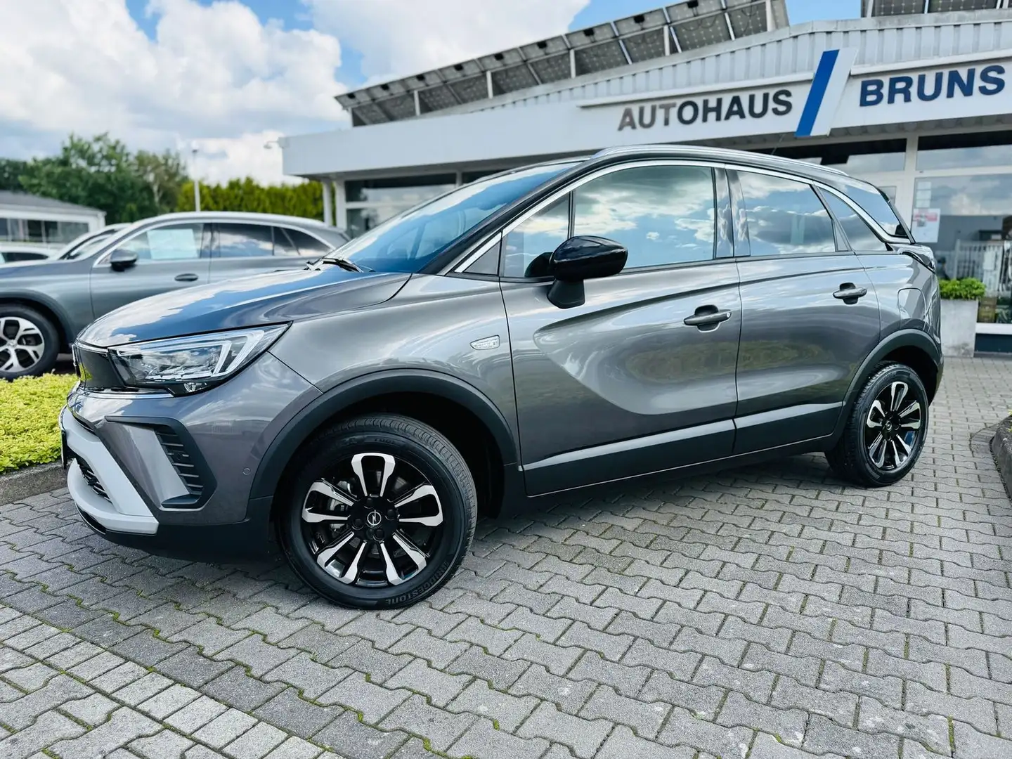 Opel Crossland X 1,2 T ELEG., Navi, Panod, LED, RFK, PTS, Tot, Spur Grijs - 2