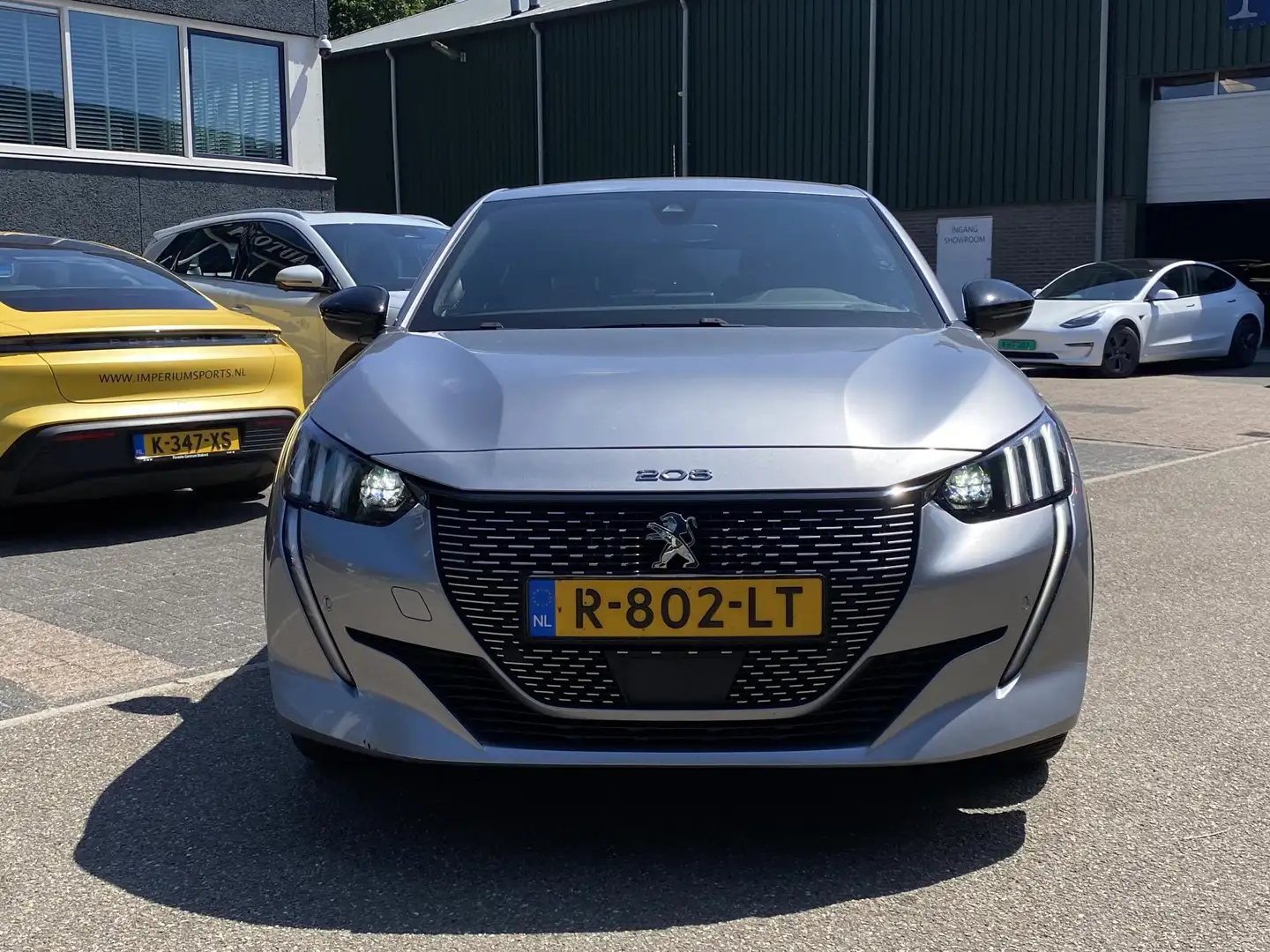 Peugeot e-208 EV GT 350 50 kWh CAMERA | DEALER ONDERHOUDEN | RIJ Grijs - 2