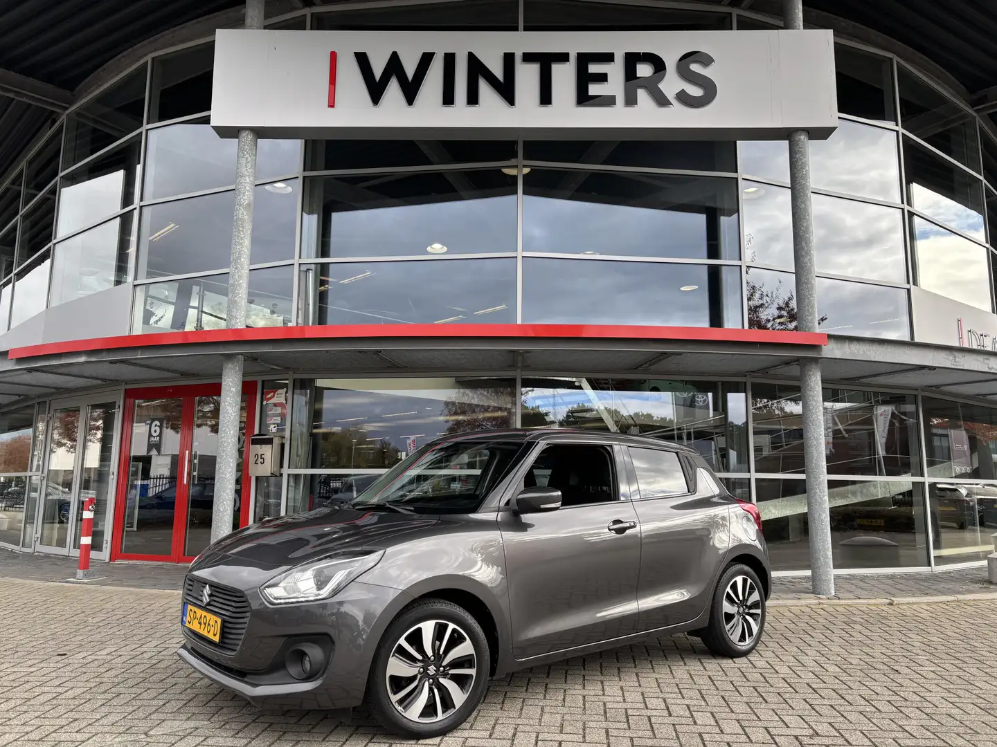 Suzuki Swift 1.2 Stijl Smart Hybrid | Navigatie | Camera | Stoe Gris - 1