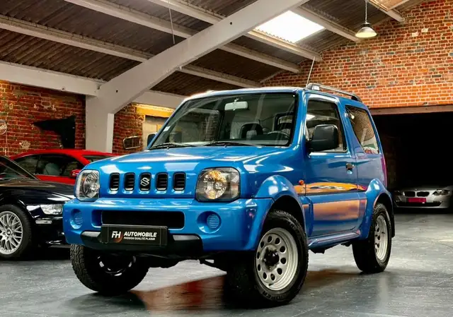 Suzuki Jimny 1.3 L VVT 4WD 82 ch Bleu Cyprus Carrosserie et châssis sains Carnet historique complet État remarquable