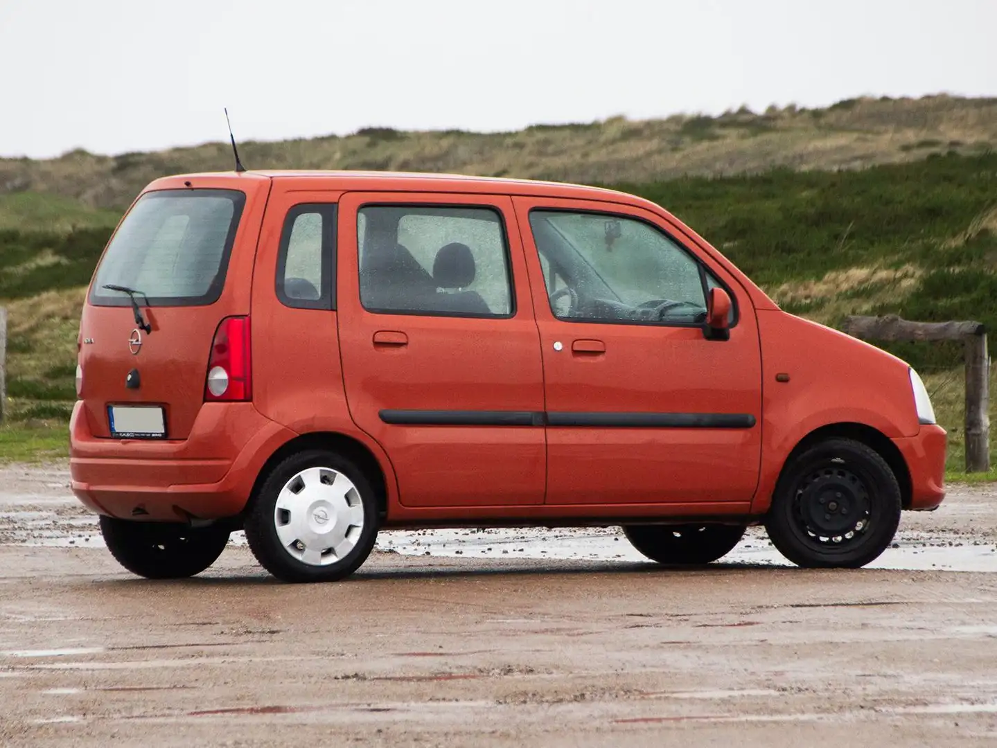 Opel Agila Agila 1.0 12 V Edition Oranje - 1