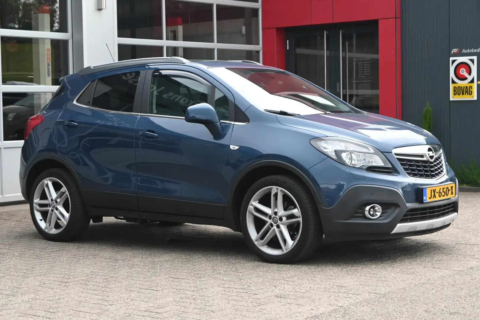 Opel Mokka 1.4 Turbo 4x4 140pk | Schuif -/ Kanteldak | Half l Blauw - 1