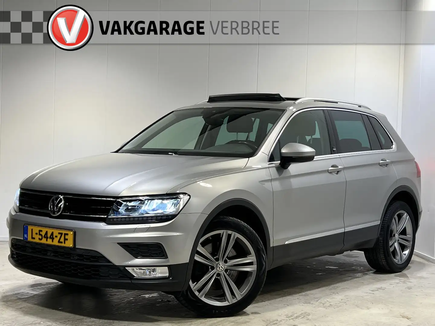 Volkswagen Tiguan 2.0 TSI 4Motion Highline | Navigatie/Android/Apple Grijs - 1
