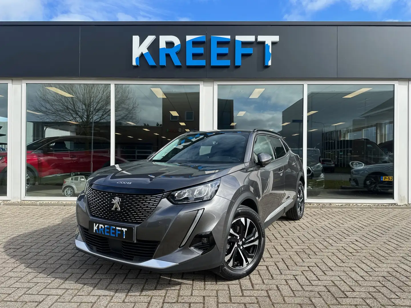 Peugeot 2008 1.2 PureTech Allure Pack Automaat | App Connect Grau - 1