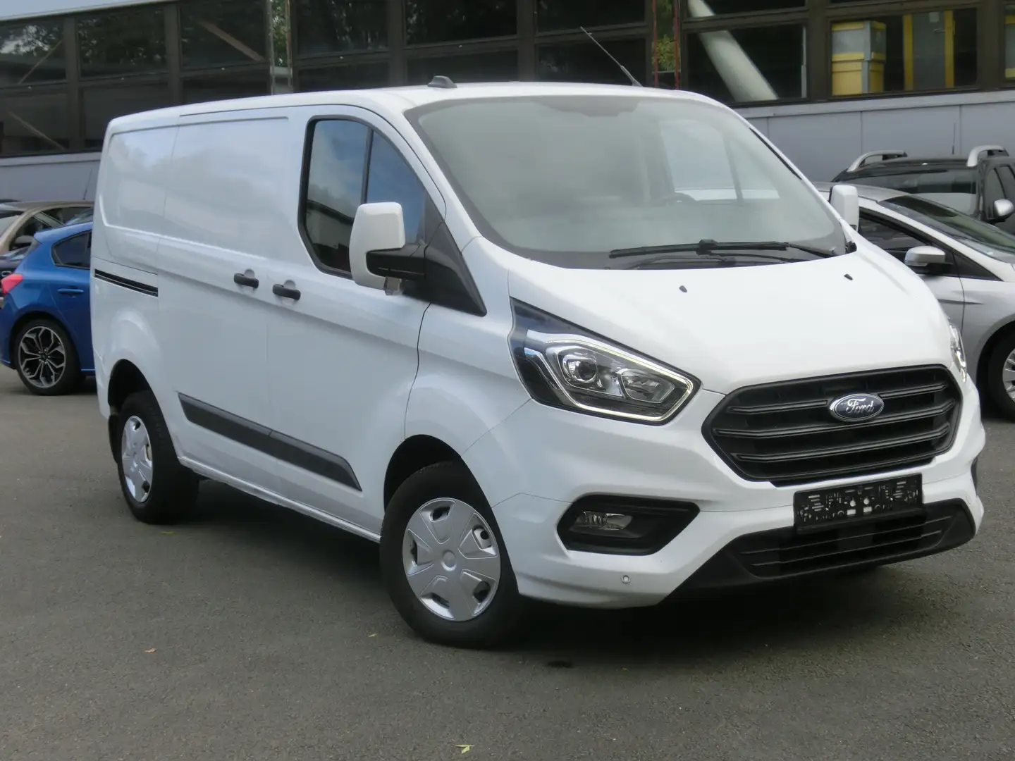 Ford Transit Custom 2.0l Eu6dT 300 L1 Trend/ Klima, Tel, 2 x PDC, AHK Weiß - 1