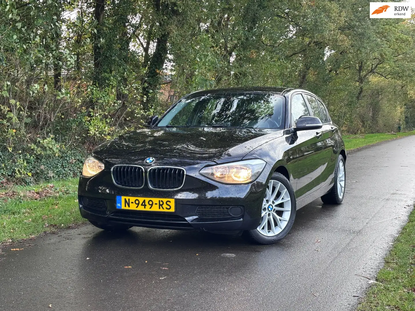 BMW 116 1-serie 116i Business+ | Stoelverwarming + Airco Schwarz - 1