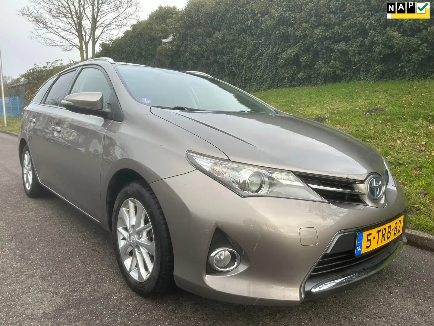 Toyota Auris Touring Sports 1.8 Hybrid Lease - Pano - Navi - Ca Brun - 1