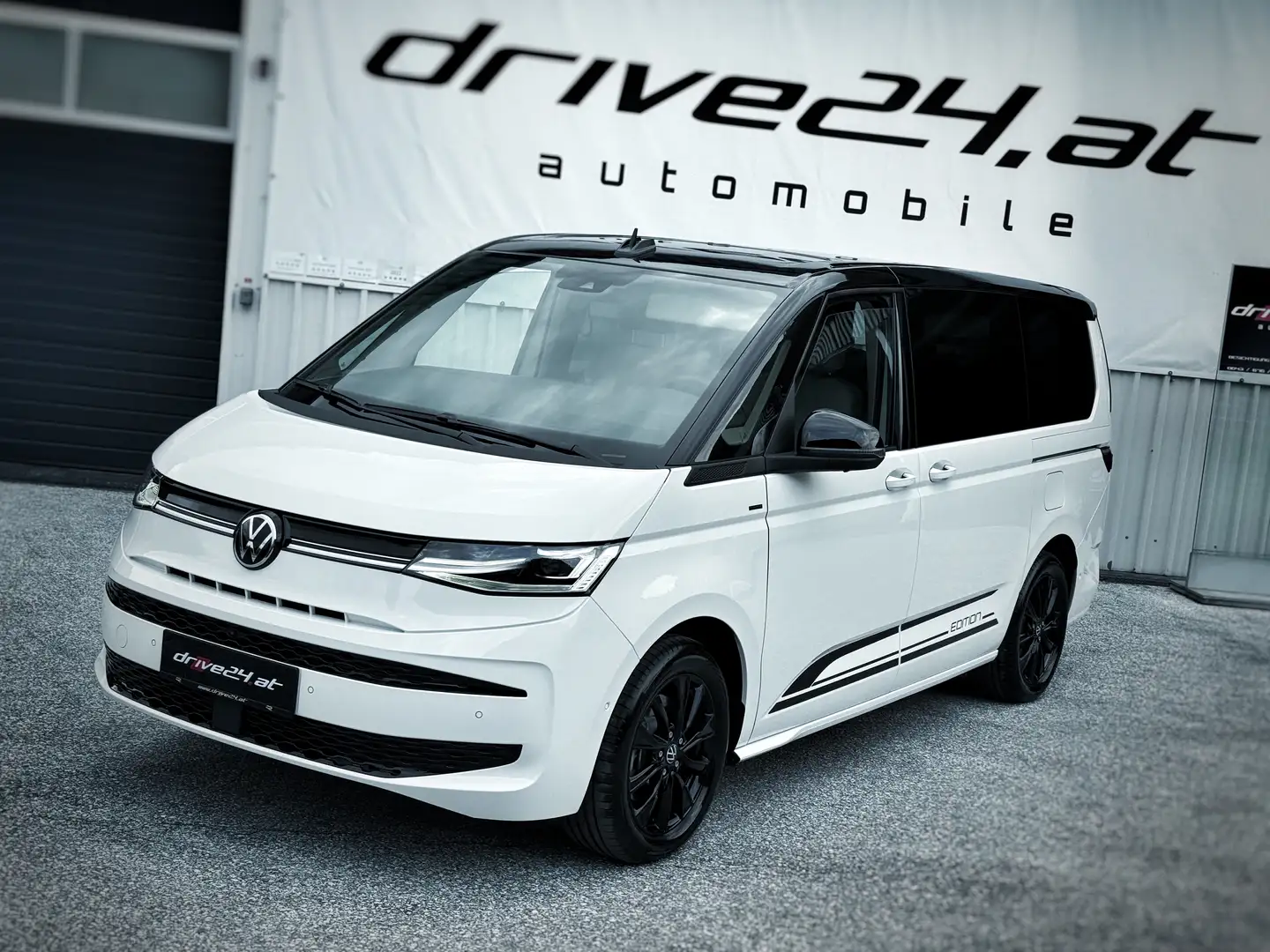 Volkswagen T7 Multivan EDITION ÜH eHybrid lang 4MOTION PANO AHK MATRIX Blanco - 1