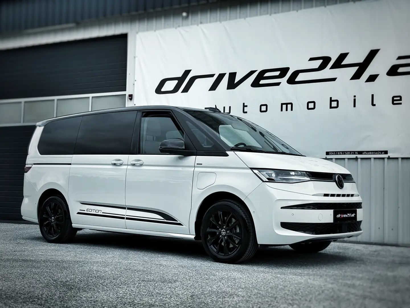 Volkswagen T7 Multivan EDITION ÜH eHybrid lang 4MOTION PANO AHK MATRIX Weiß - 1
