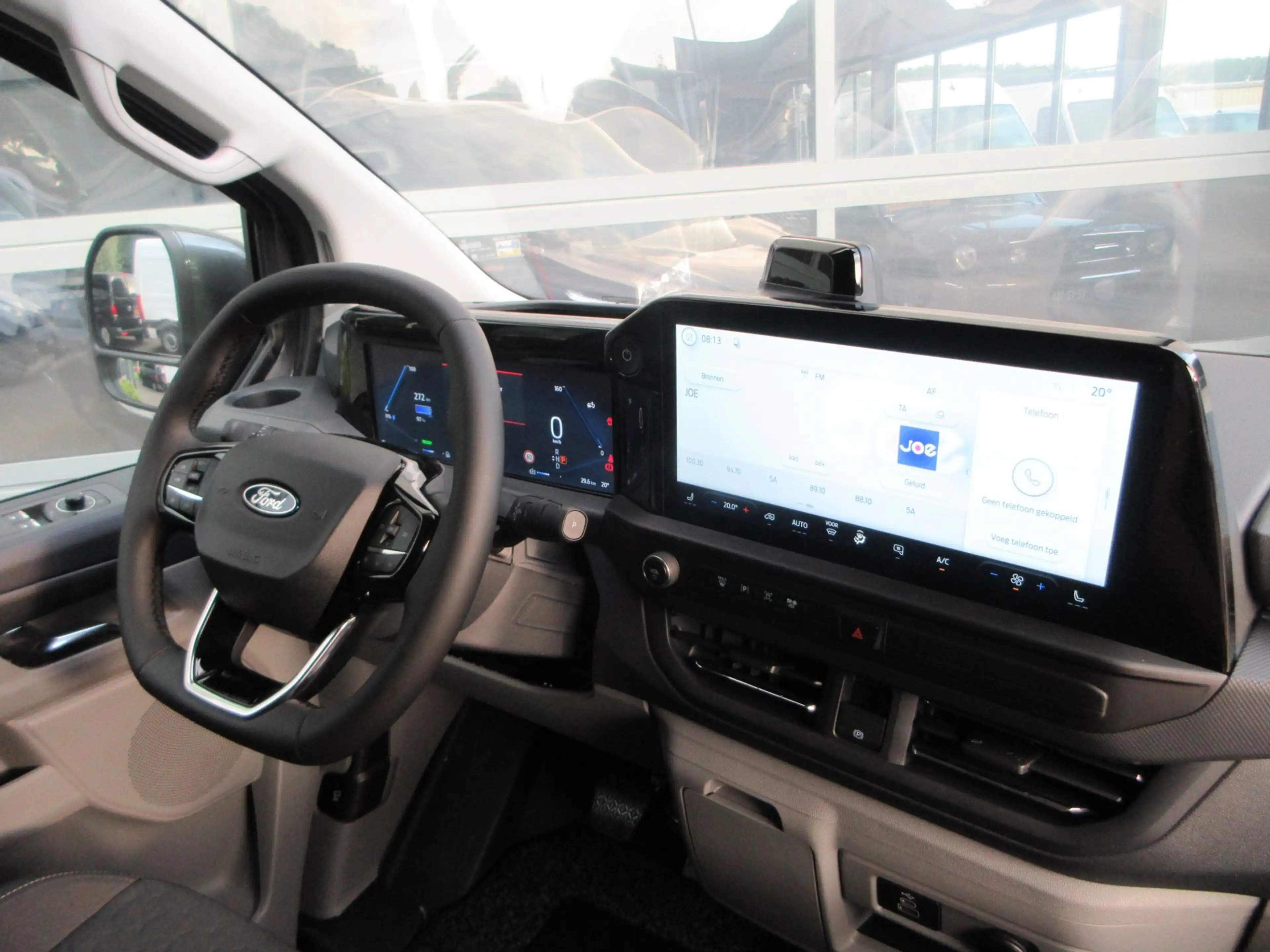 Ford E-Transit Cust. 340 L2H1 Limited 71 kWh 218 pk carplay camer — photo 10