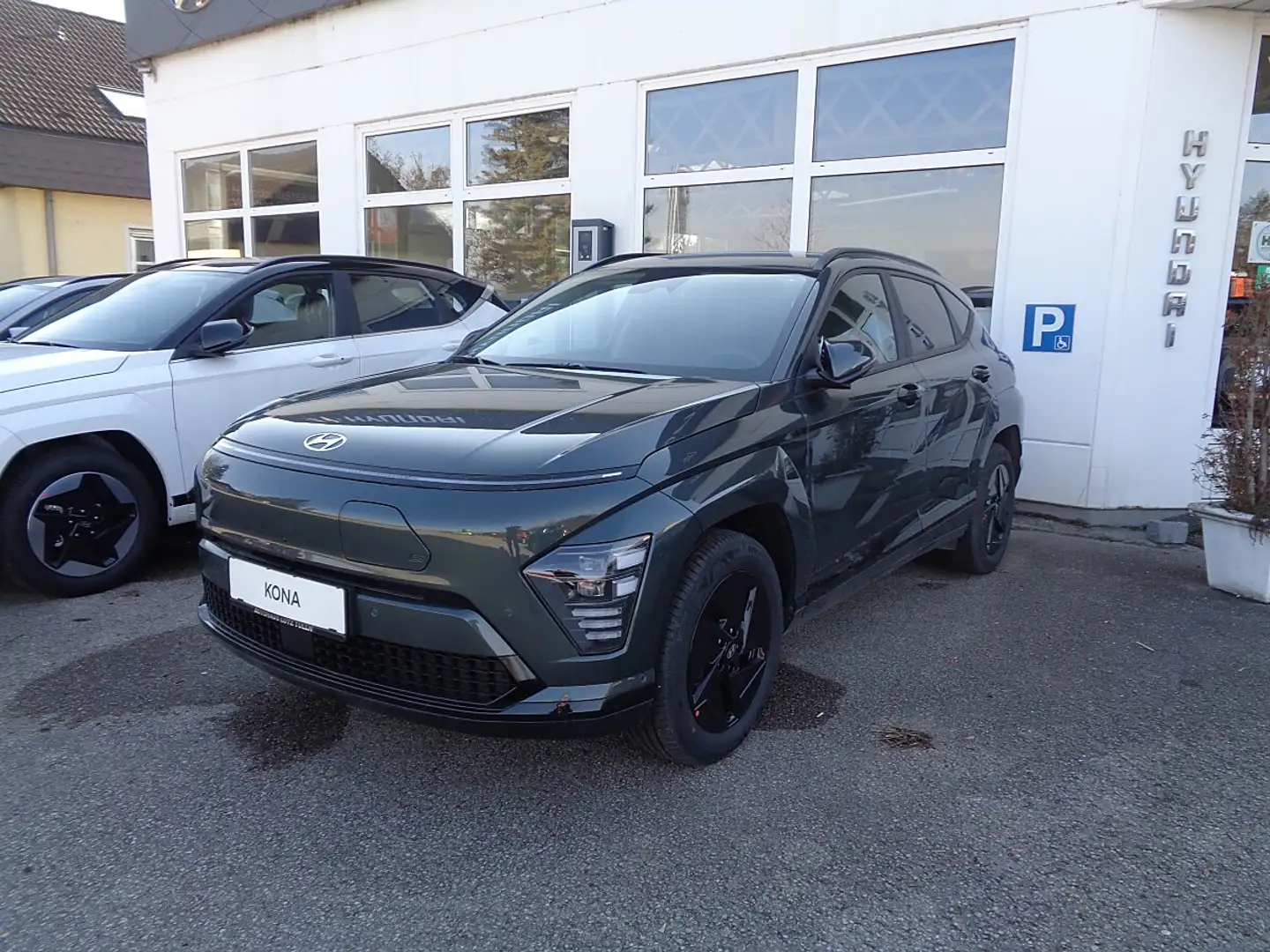 Hyundai KONA Kona Elektro 65,4kWh GO Technik-Paket, Design-P... Grün - 1