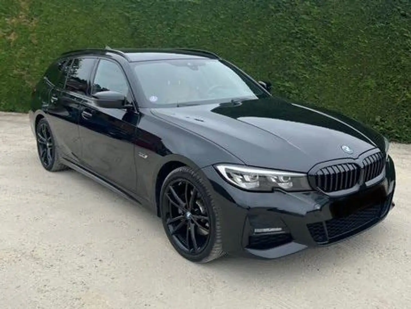 BMW 320 320e Touring Aut. Sport Line Zwart - 1