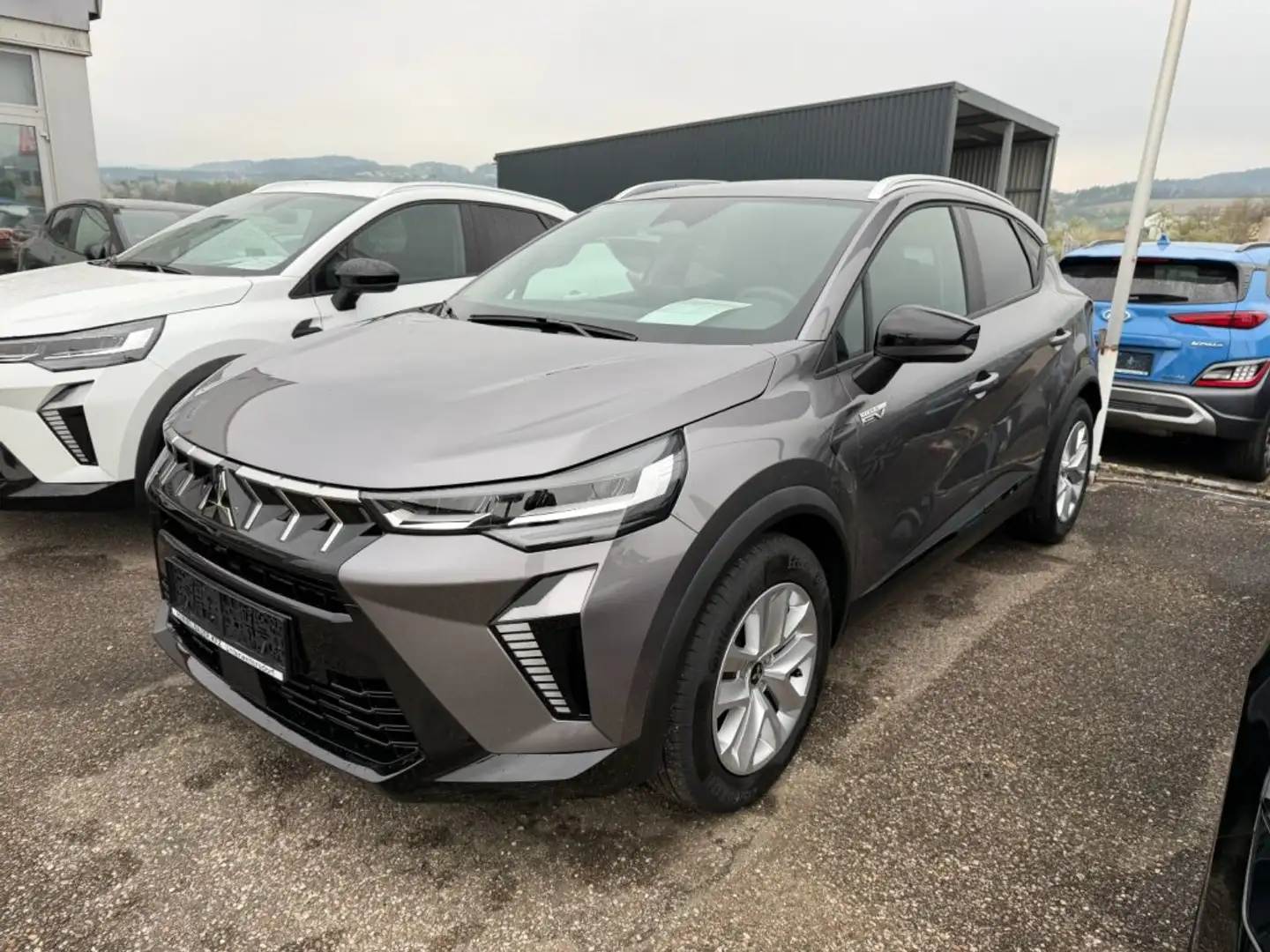 Mitsubishi ASX 1,8 HEV Invite Plus AT 26,5 Grau - 1