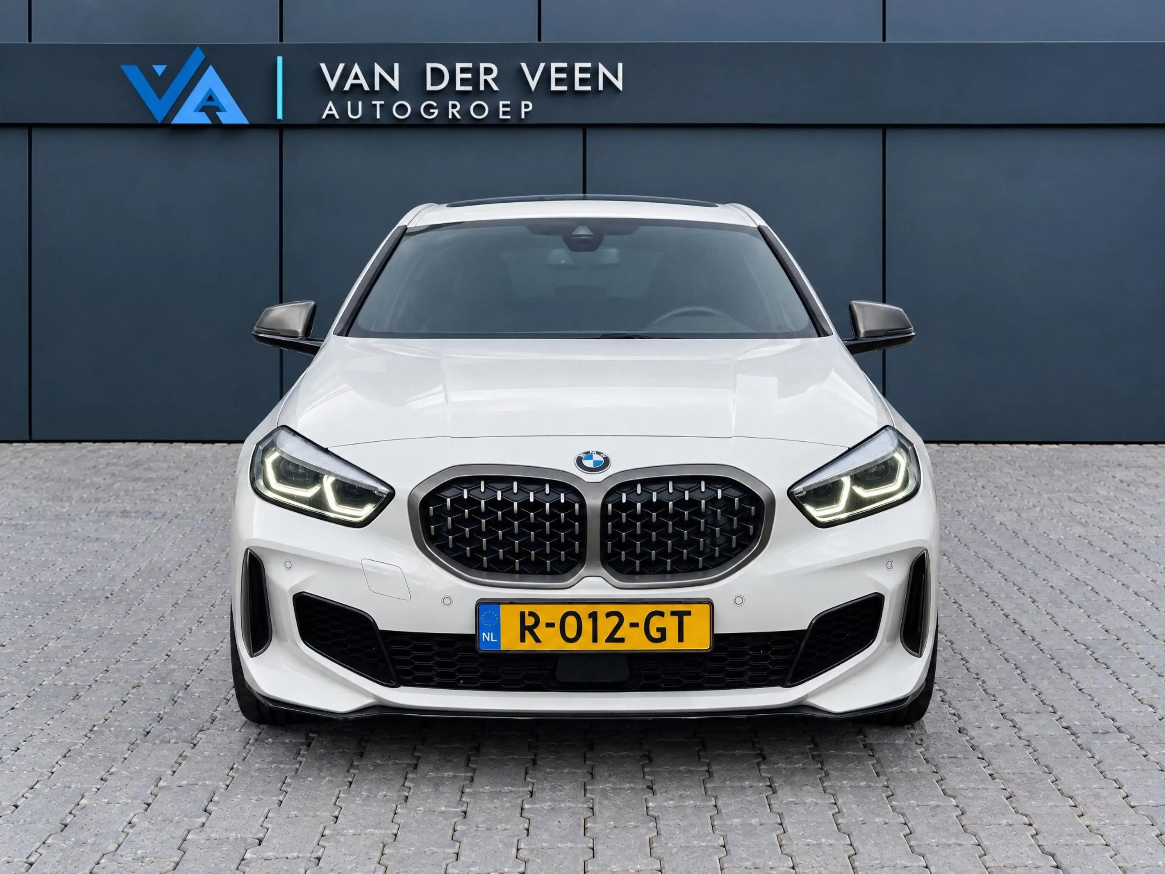 BMW 135 1-serie M135i xDrive High Executive | Incl. 12 maa — photo 10