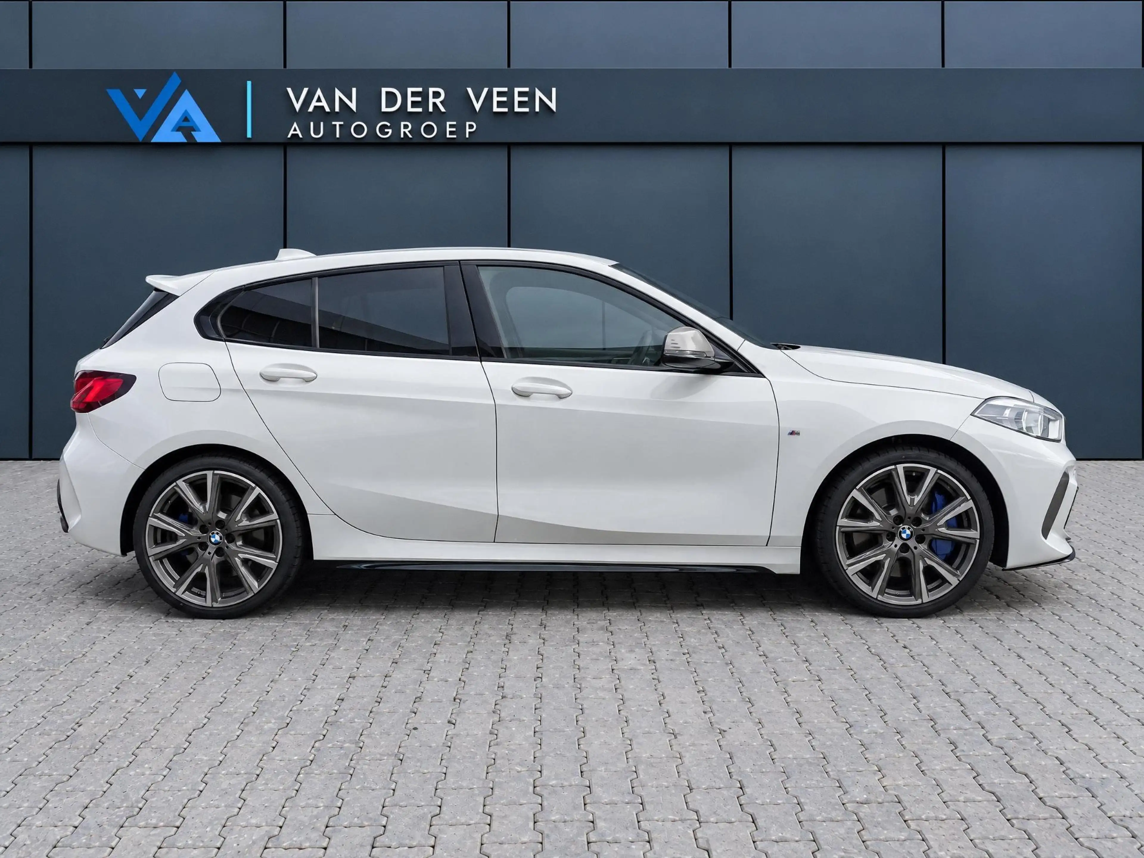 BMW 135 1-serie M135i xDrive High Executive | Incl. 12 maa — photo 13