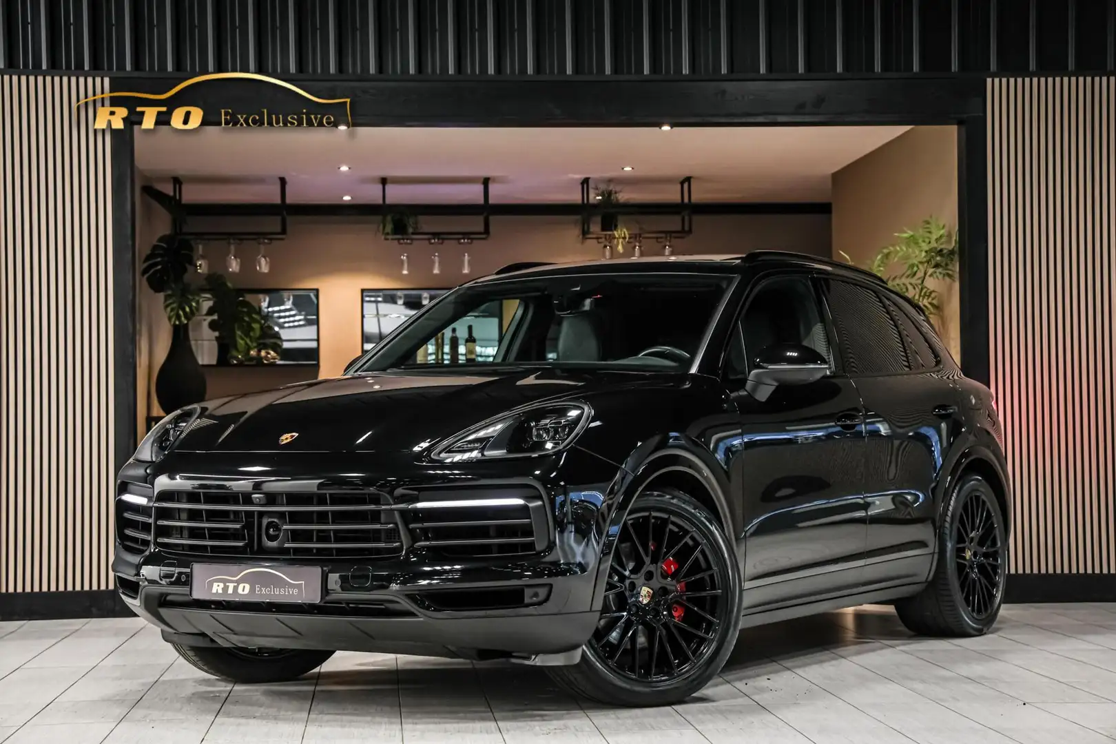Porsche Cayenne 3.0 E-Hybrid Platinum Edition|ACC|Pano|Chrono|Trek Zwart - 1
