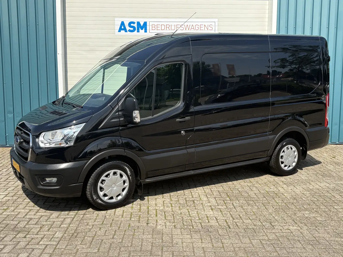 Ford Transit 310 2.0 130Pk TDCI L2H2 Trend / Cruise / Airco / T Noir - 1