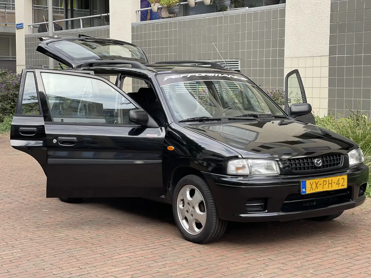 Mazda Demio 1.4 Comfort Met Lage Kilometers, foto 11