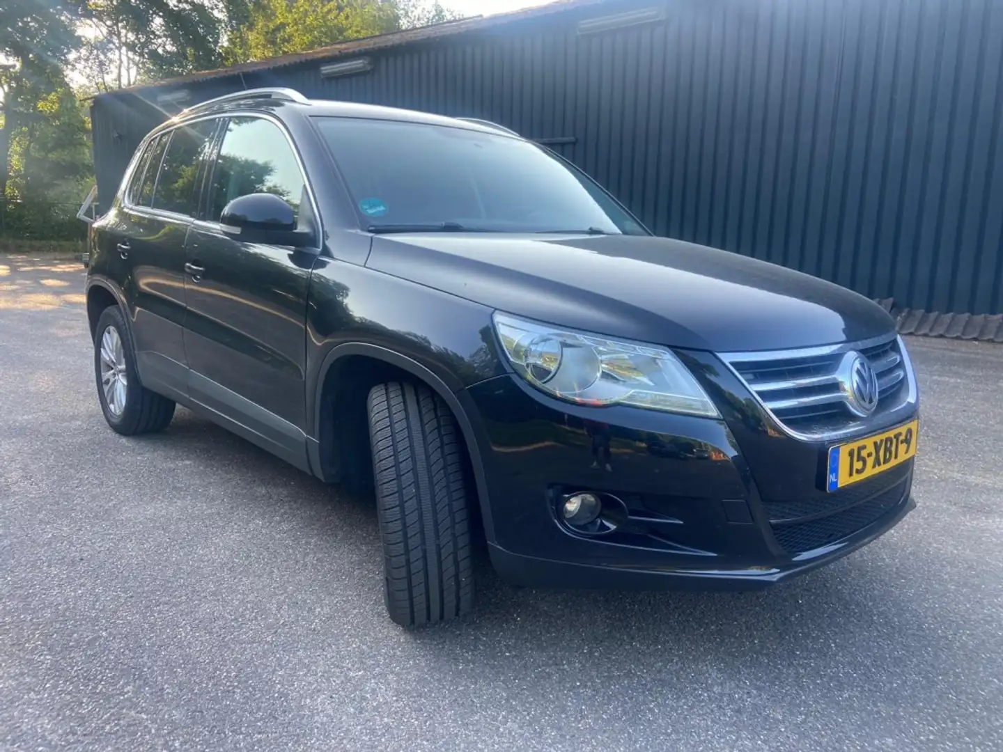 Volkswagen Tiguan 1.4 TSI Sport&St. 4M Zwart - 1
