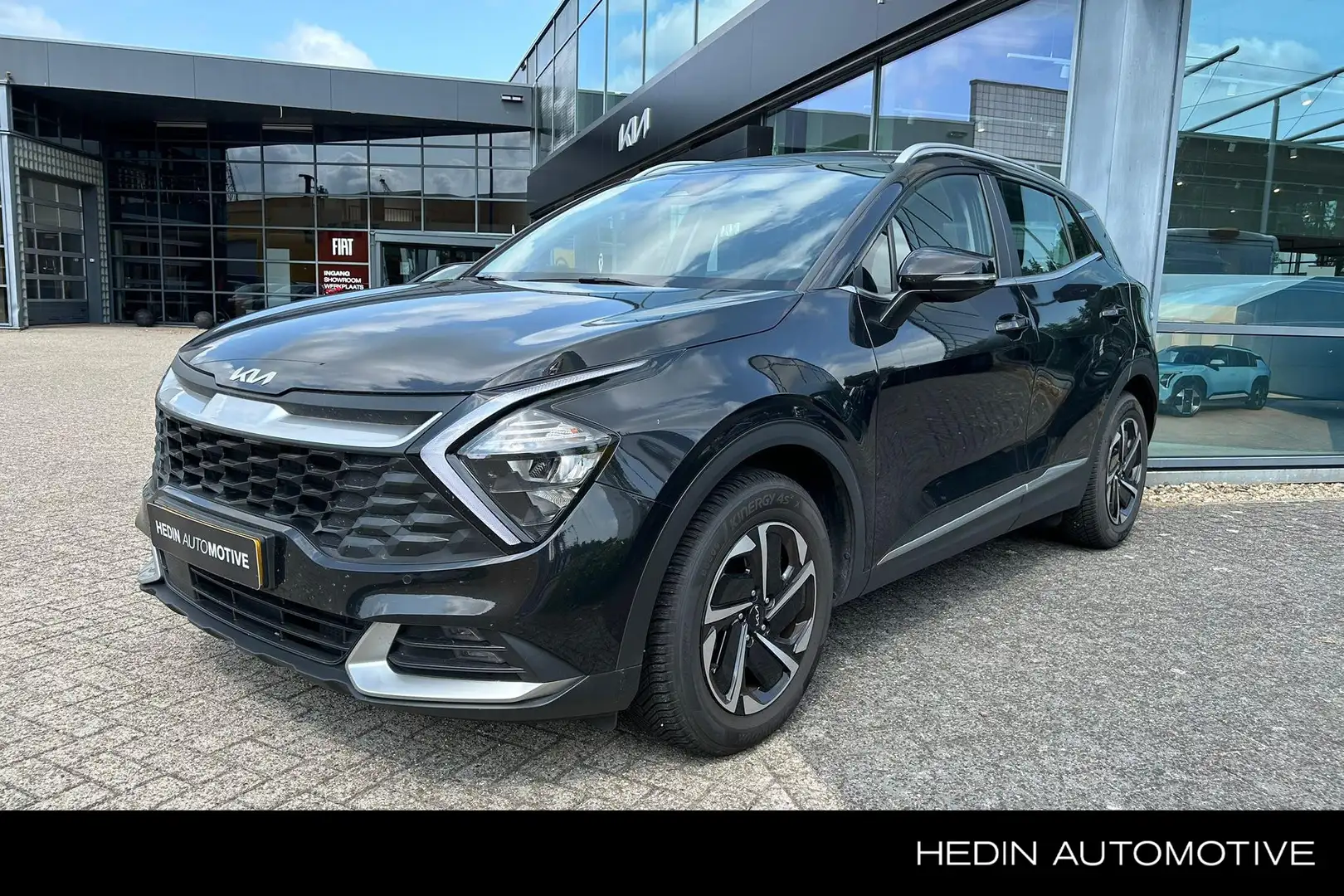 Kia Sportage 1.6 T-GDi Hybrid 230PK DynamicLine | Allseason ban Noir - 1