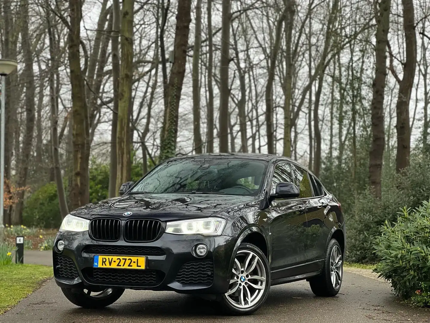 BMW X4 xDrive20d High Executive/M-Sport/HUD/CAM/SCHUIFDAK Zwart - 1