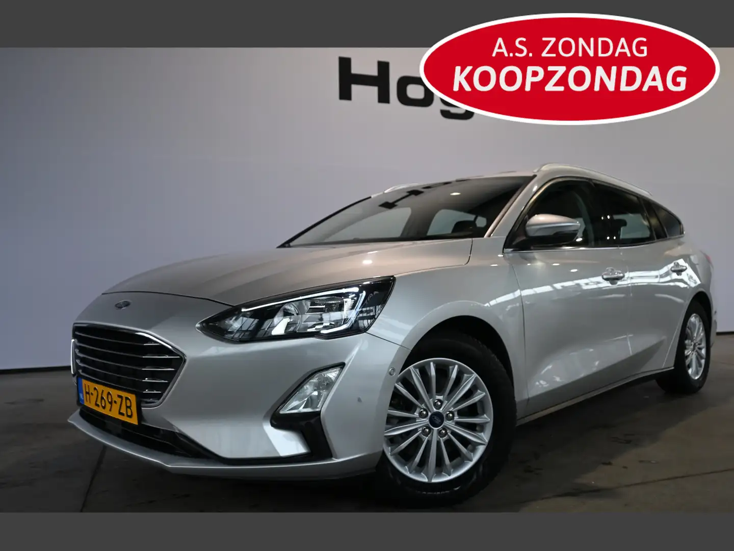 Ford Focus Wagon 1.0 EcoBoost Titanium Business Navigatie 1e Grijs - 1