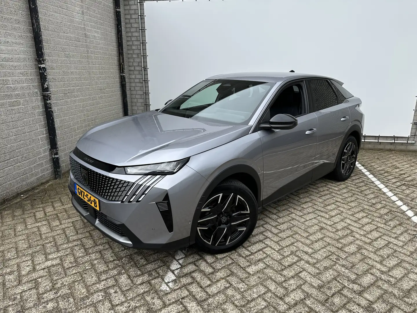 Peugeot 3008 1.2 Hybrid 136 Allure | Achterbank in delen neerkl Gris - 1