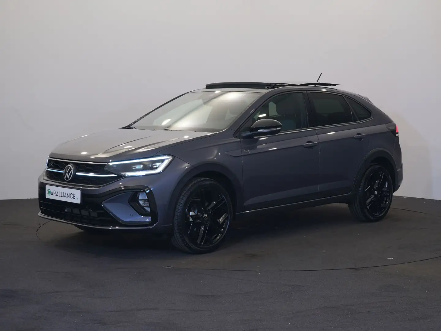 Volkswagen Taigo R-Line  1.0TSI|DSG|BlackStyle|Pano|JA18|NavByAPP|M Gris - 1