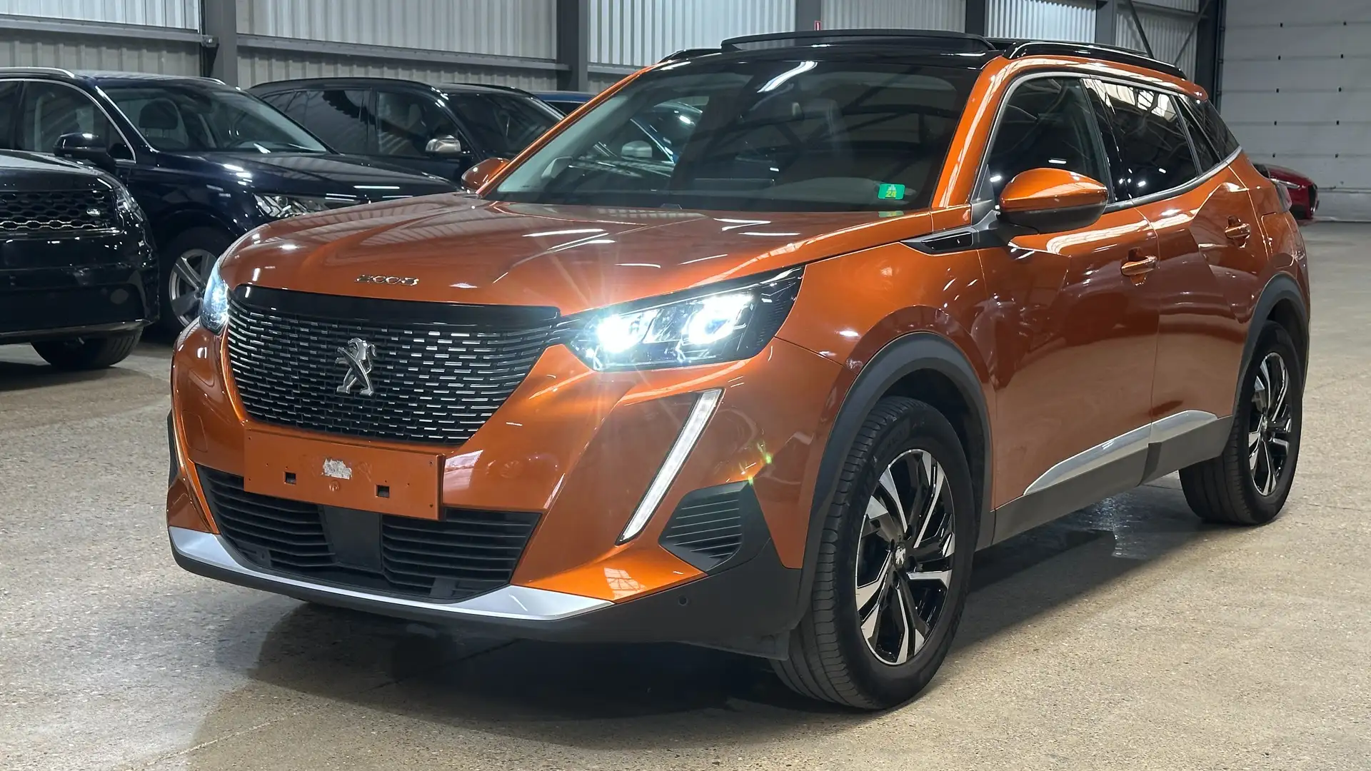 Peugeot 2008 1.5 BlueHDi Allure S Oranje - 1