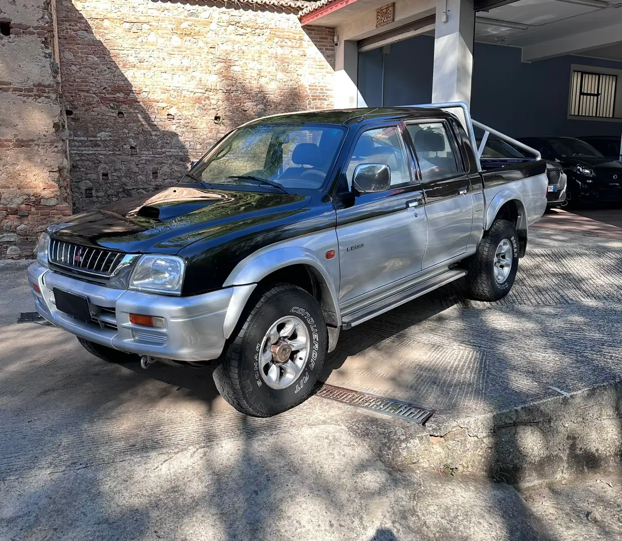 Mitsubishi L200 d.cab 2.5 tdi GLS Target 4wd - 1