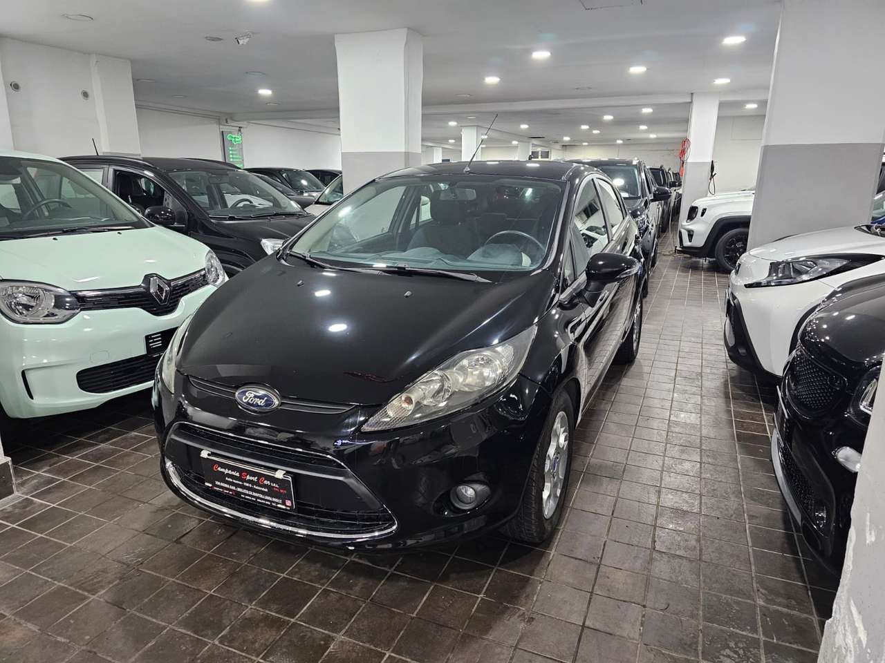 Ford Fiesta 5 PORTE TITANIUM 1.4 TDCI 70CV - TAGLIANDATA