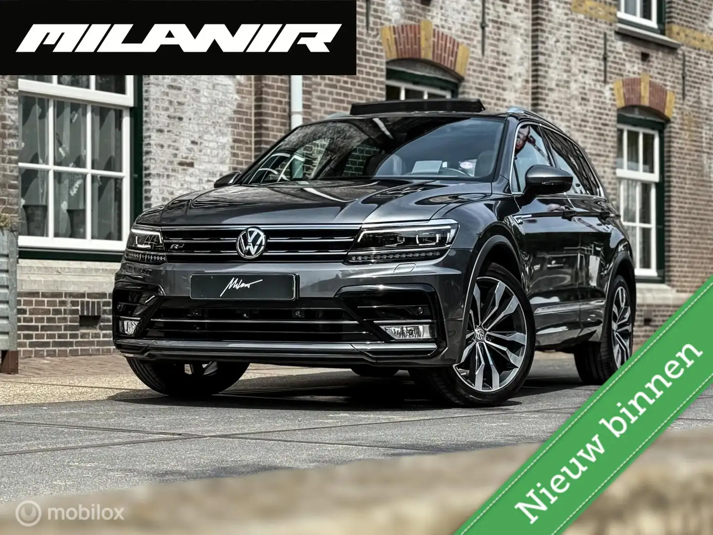 Volkswagen Tiguan 2.0 TSI 4Motion Highline|Pano|HUD|Dinaudio Grijs - 1