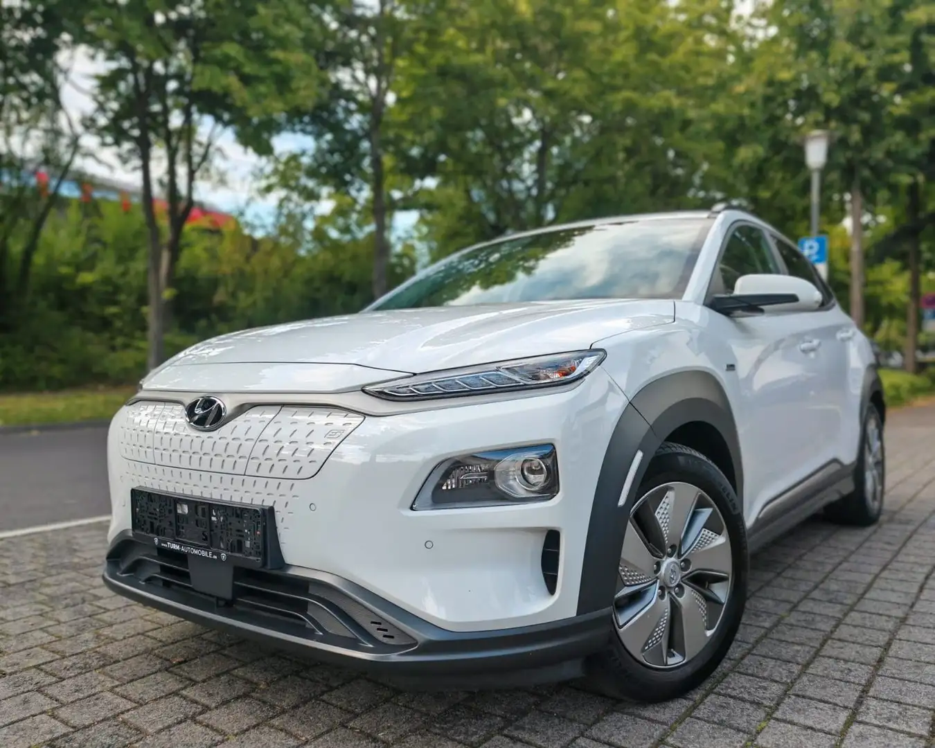 Hyundai KONA Premium Elektro 64kWh|Schiebed|Sitzp|SOH97% Weiß - 1