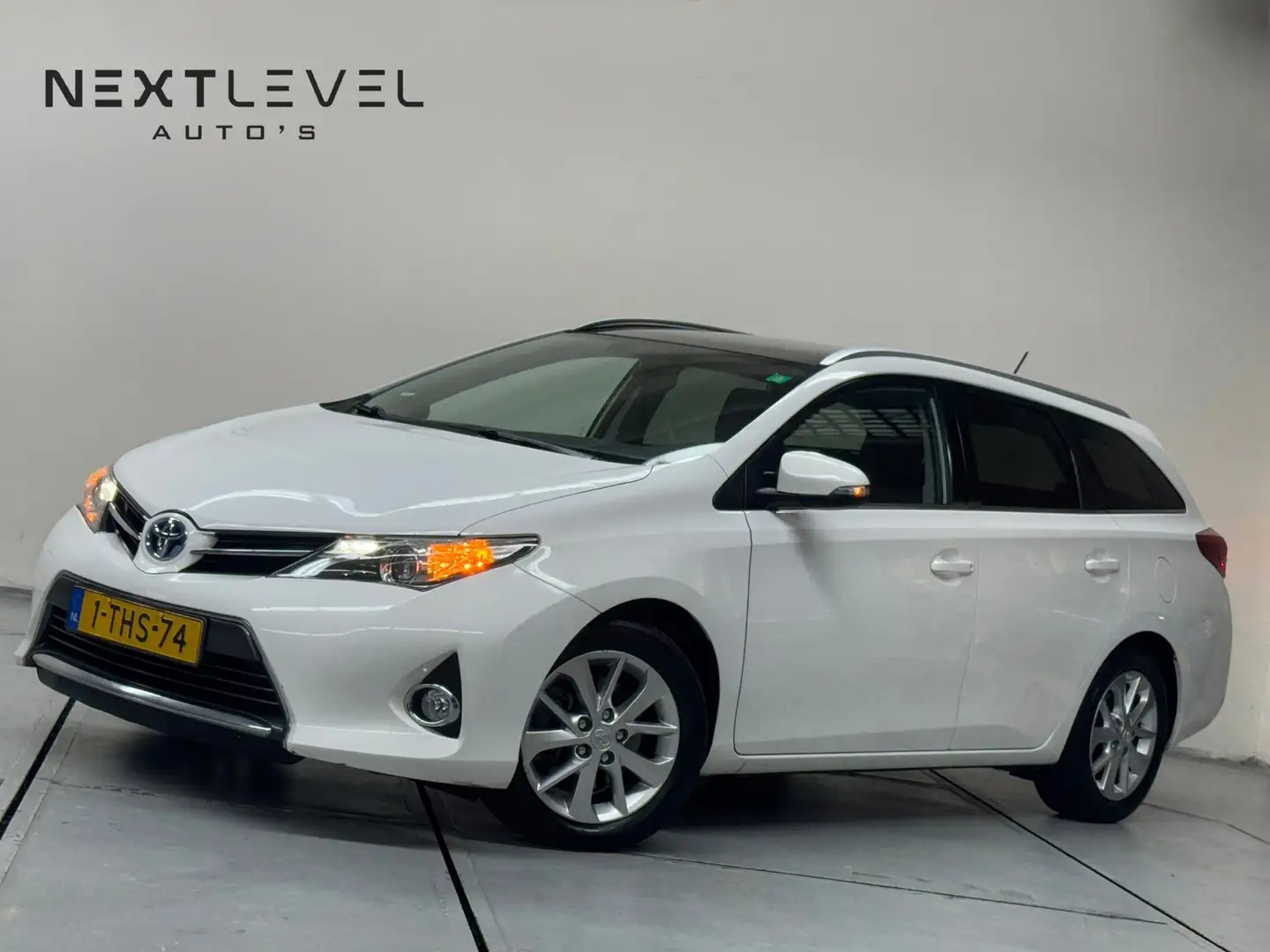 Toyota Auris Touring Sports 1.8 Hybrid Lease Pano Cruise Camera Weiß - 1