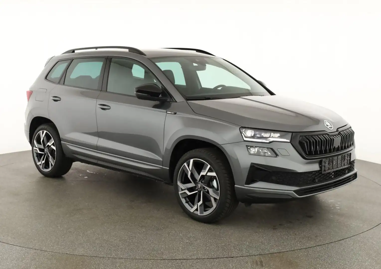 Skoda Karoq Sportline 4x4 2.0 TSI DSG Sportline, AHK, Navi,... Grau - 1
