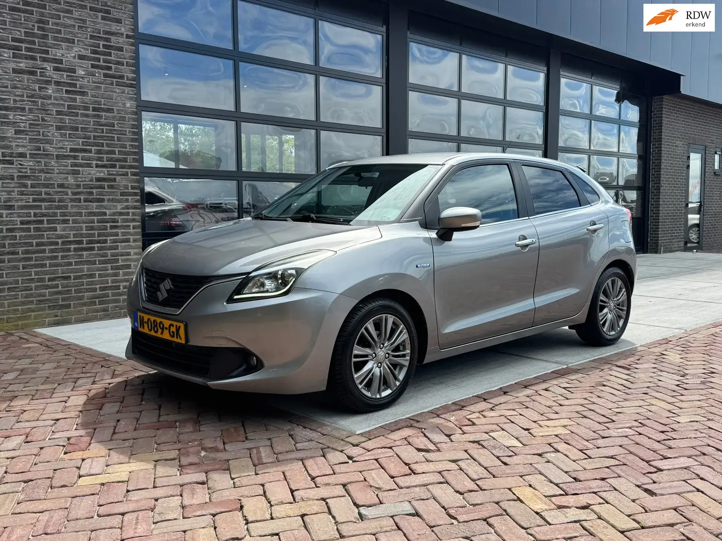 Suzuki Baleno 1.2 Smart Hybrid High Executive | Navi | Clima | C Gris - 1