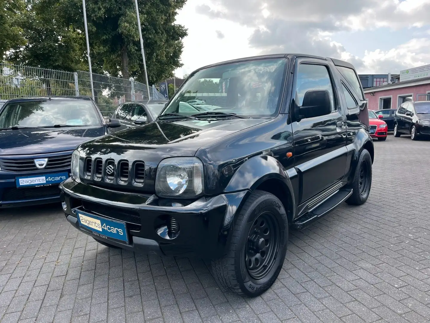 Suzuki Jimny Cabrio mit Hardtop°4X4°AHK°Garantie°HU neu Schwarz - 1
