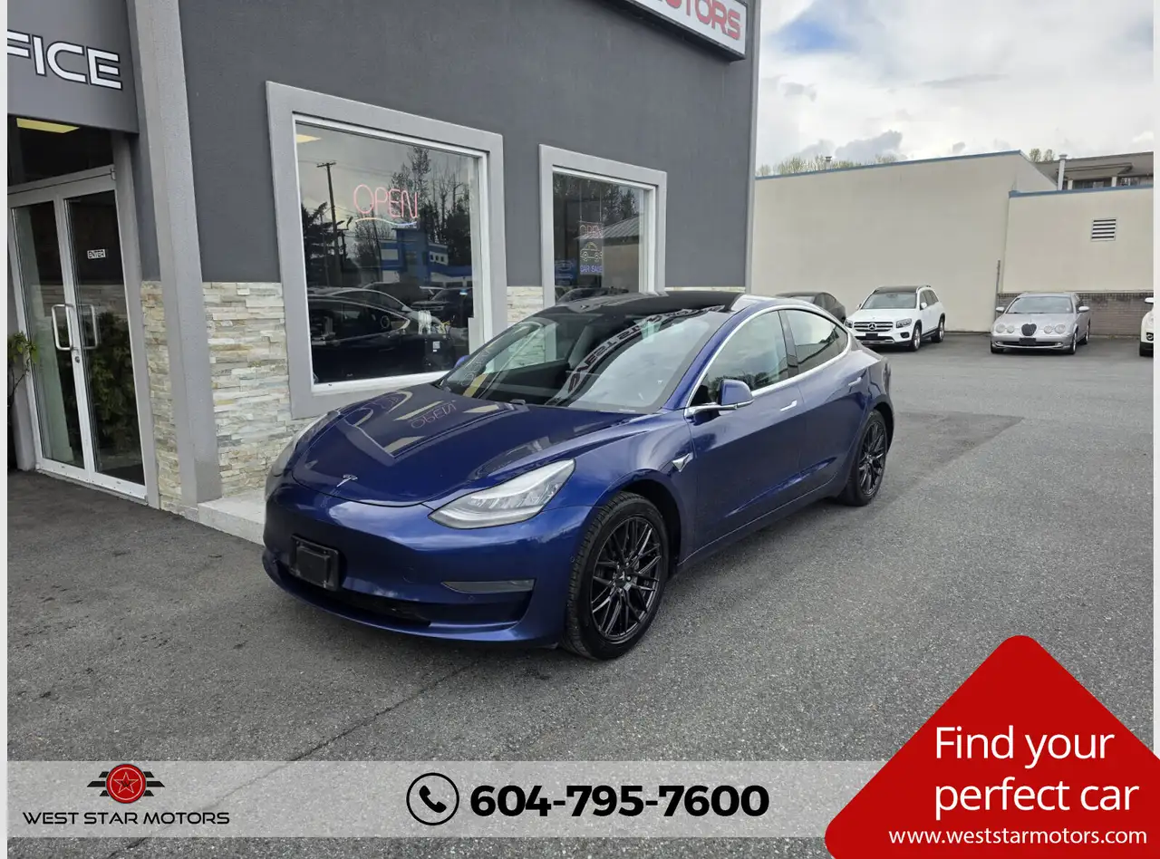 Tesla Model 3 photo Tesla Model 3