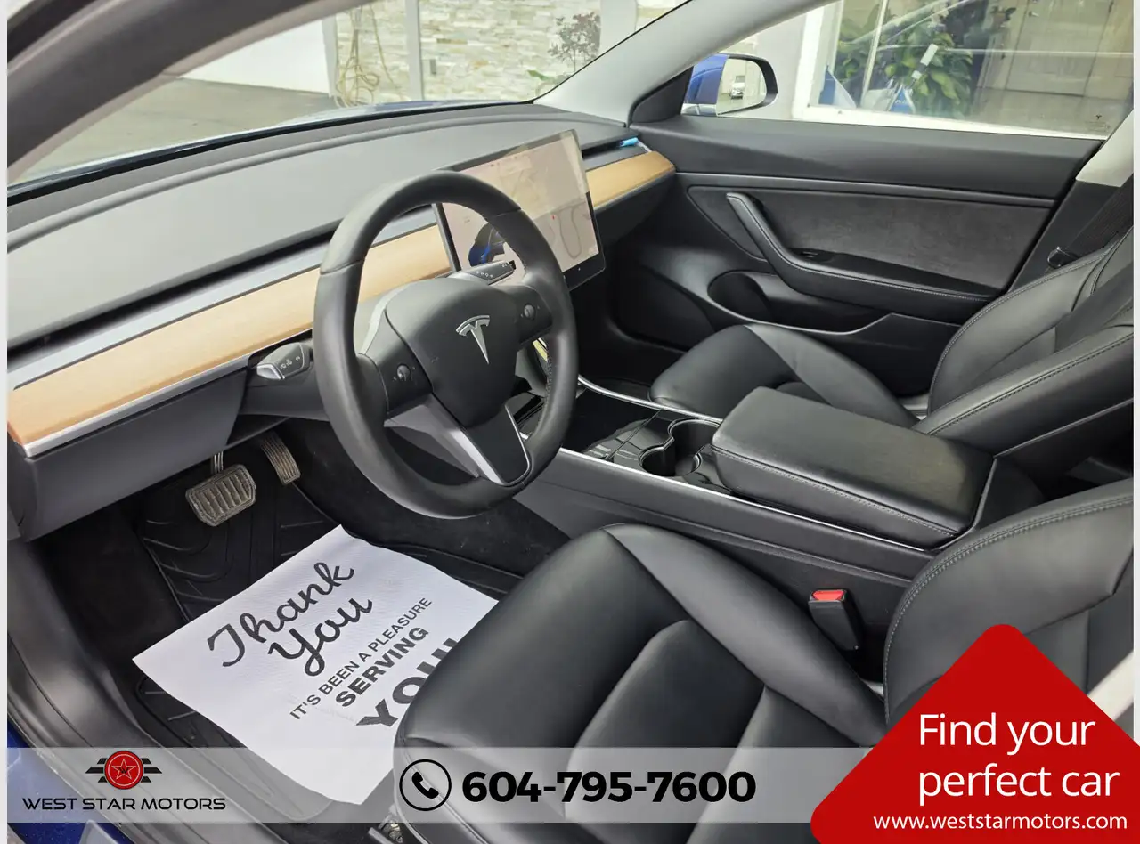 Tesla Model 3 photo Tesla Model 3