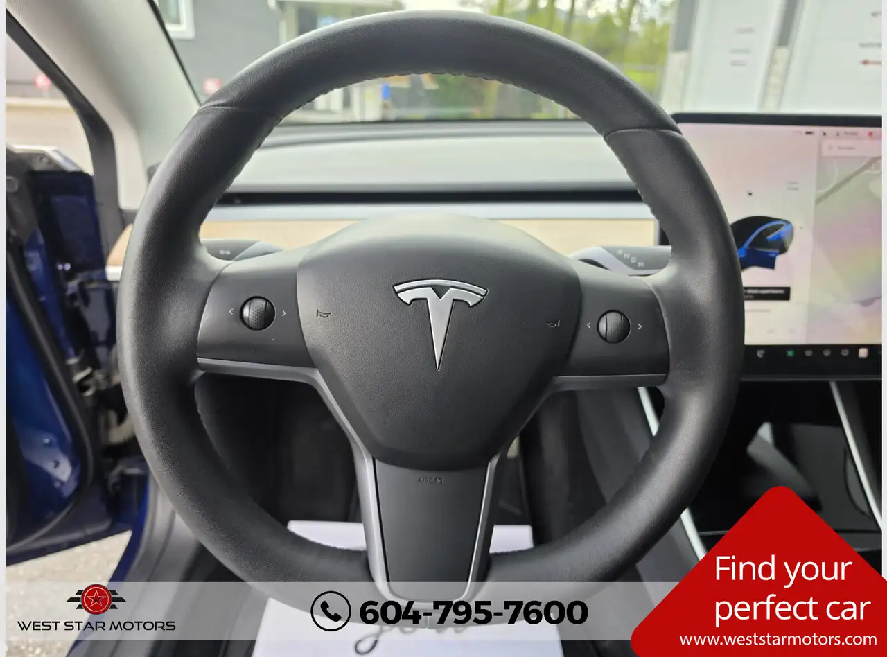 Tesla Model 3 photo Tesla Model 3